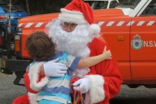 hugging Santa