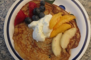sourdough pancake with berries, peach and nectarine